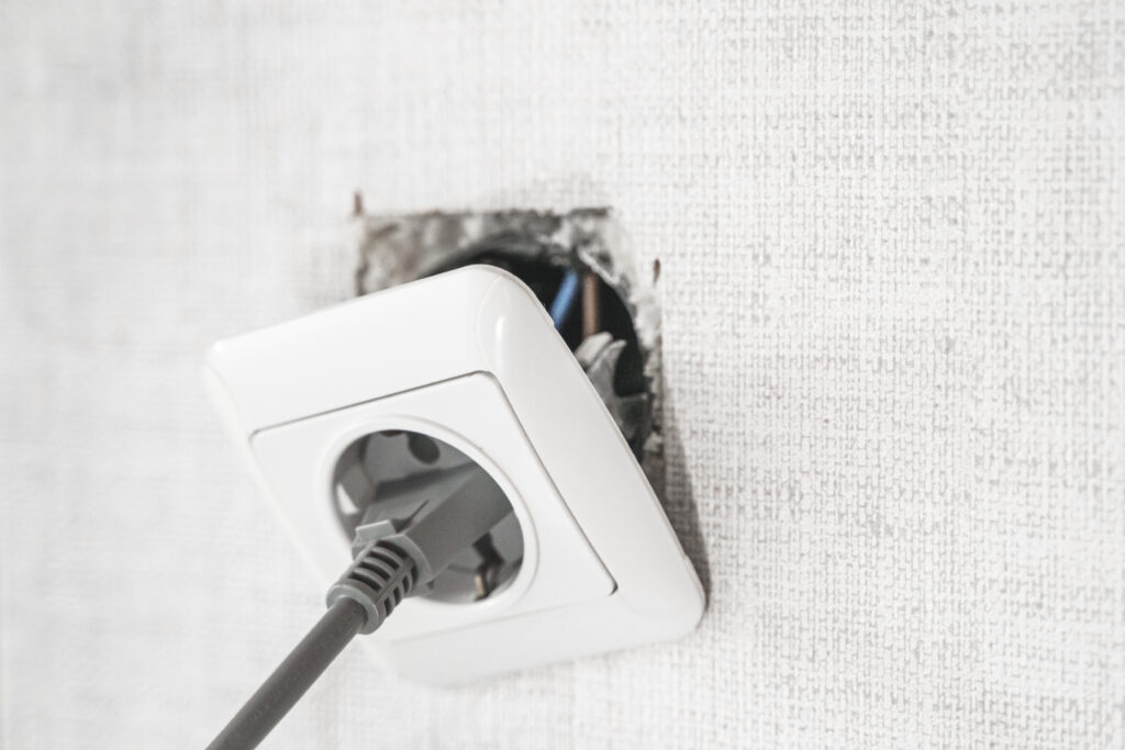 Dangerous bad,broken socket,plug in bathroom,falling out of wall. Outlet installation in old apartment. Poor electrical wire,repair.Terrible do-it-yourself repairmen.Short circuit risk,electric shock. Boca Electrical Services Boca Raton