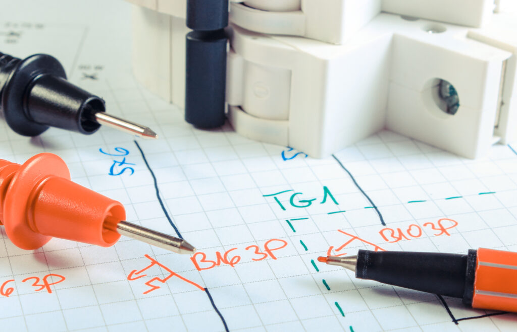 Cables of multimeter and electric fuse on construction